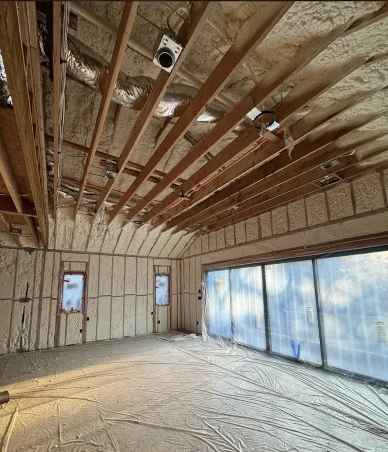 Interior walls and ceiling insulated with spray foam during new construction in East Coventry